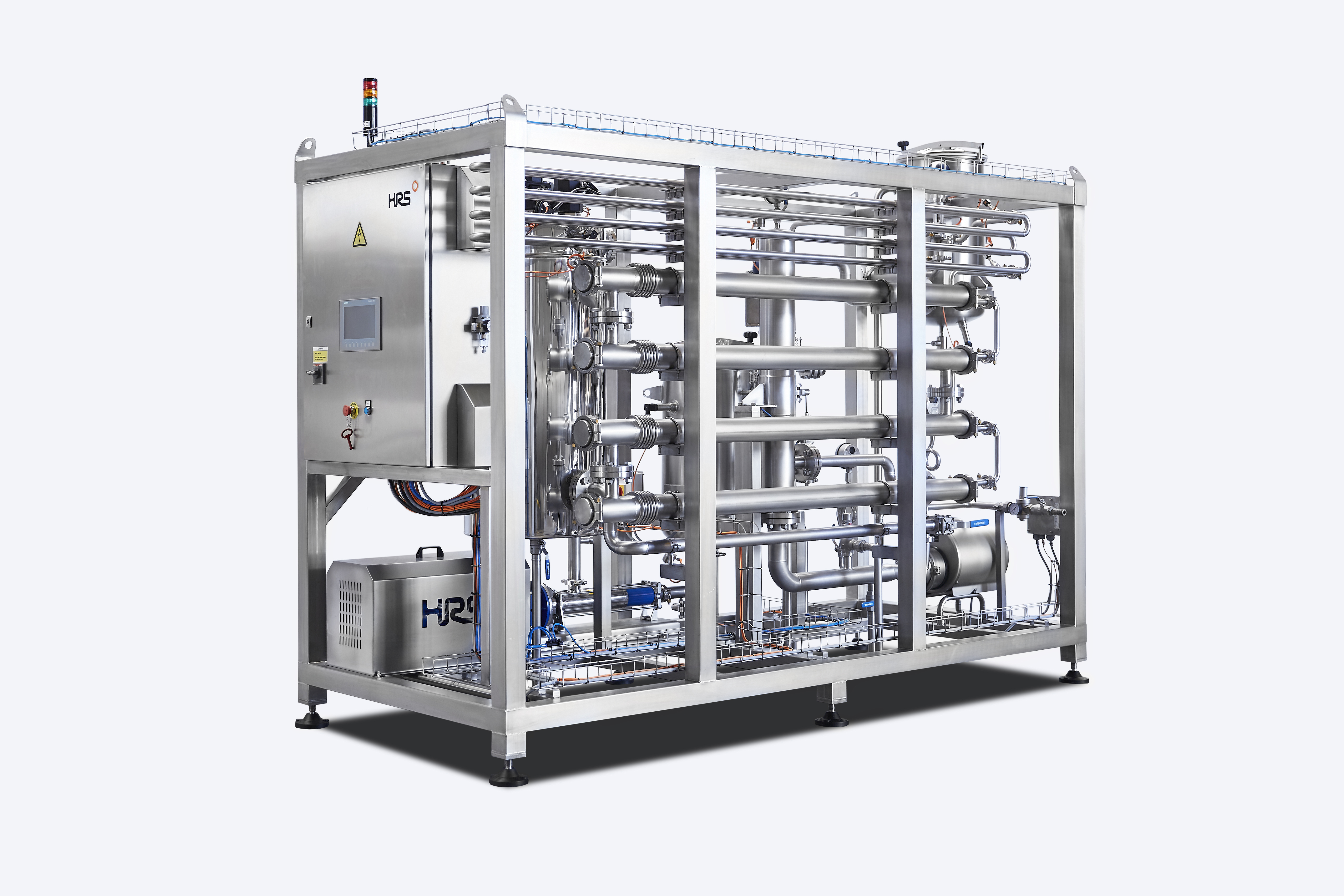 Industrial processing machine with stainless steel frame, control panel, and internal piping systems