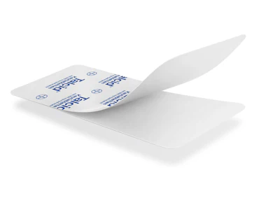 White folded material or packaging mockup with blue 'PROFIT' text repeated across the surface