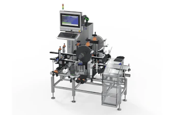 Industrial labeling machine with CRT monitor, mechanical components, and metal frame for product packaging automation