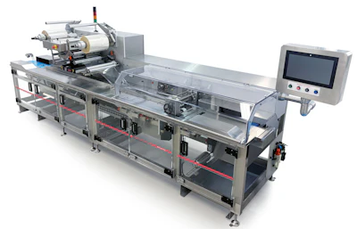 Industrial automated packaging machine with conveyor belt, control panel, and labeling equipment