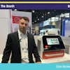 Professional presenting packaging equipment at Pack Expo booth W-24060 trade show