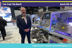 Professional demonstrating FM 300 packaging machinery at Pack Expo booth S-2939