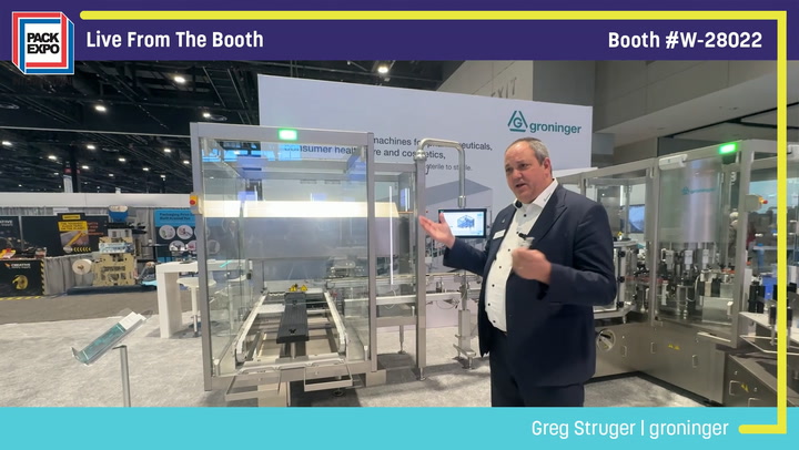 Man in business attire presenting at Groninger booth W-28022 during Pack Expo trade show