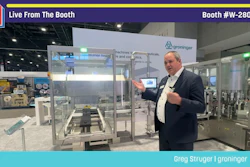 Man in business attire presenting at Groninger booth W-28022 during Pack Expo trade show
