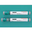 Two Schreiner MediPharm Pharma-Label tubes for pens and autoinjectors with green patterned sleeves on turquoise background