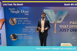 Presenter demonstrating single-dose pharmaceutical packaging at Pack Expo booth S-2042